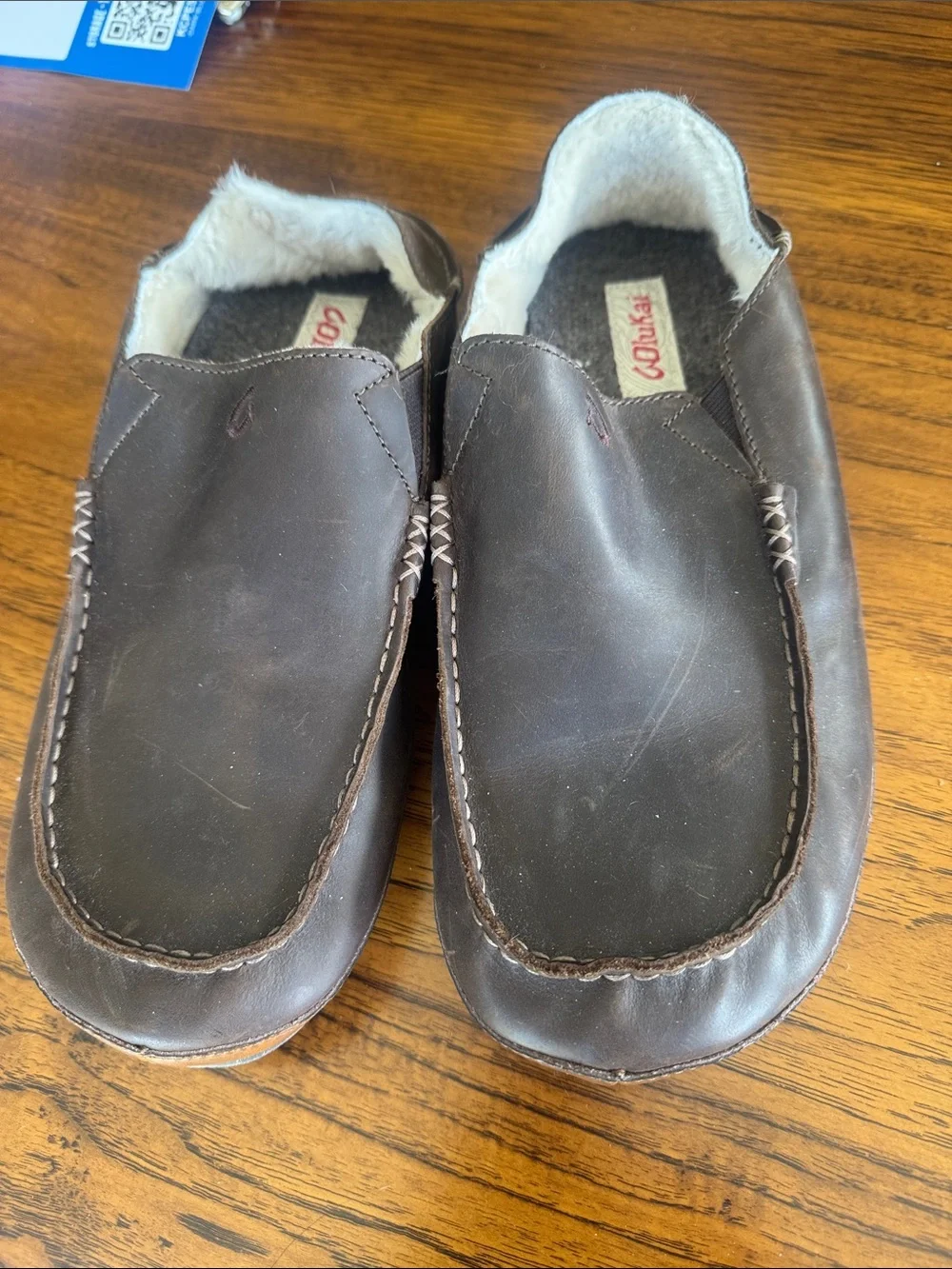 OluKai Men's Dark Brown Leather Slip-On Moccasin with Shearling Lining
